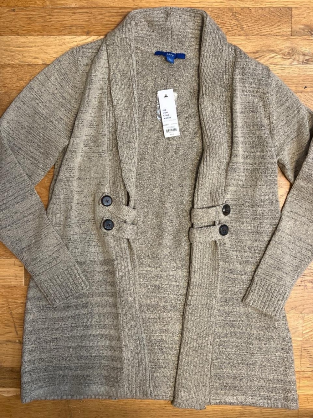 Gray cardigan with button-up front and ribbed cuffs and hem